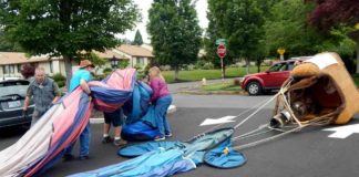 Tigard’s Festival of Balloons kicks off with emergency landing in Summerfield After the inflated balloon was "walked" across Summerfield Drive to the Clubhouse parking lot and deflated, the crew rolled up the balloon and stuffed it into a canvas bag