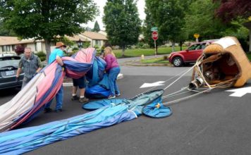 Tigard’s Festival of Balloons kicks off with emergency landing in Summerfield After the inflated balloon was "walked" across Summerfield Drive to the Clubhouse parking lot and deflated, the crew rolled up the balloon and stuffed it into a canvas bag