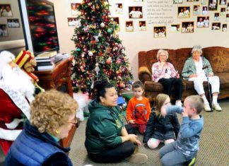 Inter-generational daycare brings seniors and children together A Gentog staff member (center) leads a lesson in sign language to both seniors and pre-kindergartners at the inter-generational daycare that features daily interactions between the two groups.
