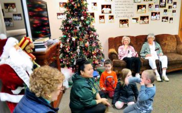 Inter-generational daycare brings seniors and children together A Gentog staff member (center) leads a lesson in sign language to both seniors and pre-kindergartners at the inter-generational daycare that features daily interactions between the two groups.