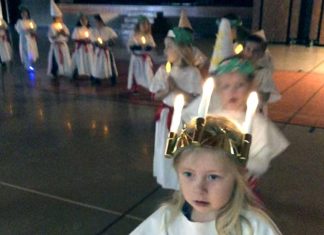 Kindergartners learn about different December traditions and cultures St. Lucia procession.