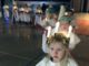 Kindergartners learn about different December traditions and cultures St. Lucia procession.