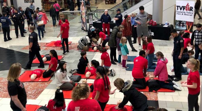 TVF&R, Tigard Police and Valley Catholic teach Hands-Only CPR at Washington Square Mall