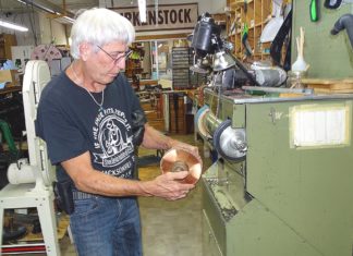 Tigard Cobbler Calls it Quits, Looks to Pass on Legacy Don Myers operates a jack sander using a 24-grit carbide wheel in his Tigard shoe repair shop. Photos by Barbara Sherman.