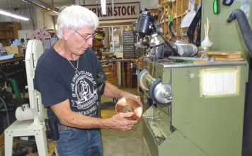 Tigard Cobbler Calls it Quits, Looks to Pass on Legacy Don Myers operates a jack sander using a 24-grit carbide wheel in his Tigard shoe repair shop. Photos by Barbara Sherman.