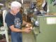 Tigard Cobbler Calls it Quits, Looks to Pass on Legacy Don Myers operates a jack sander using a 24-grit carbide wheel in his Tigard shoe repair shop. Photos by Barbara Sherman.