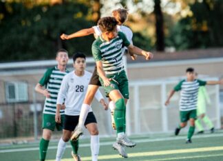 Starting up the season, Tigard soccer bested by rival Jair Nunez Acosta battles for the ball with Tualatin’s Leo Fulcher