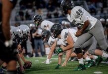 Tigard’s defensive line sets up against Mountainside in their first win of the season on Sept. 19.