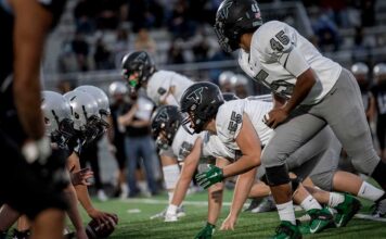 Tigard’s fall sports finish off the season – a recap Tigard’s defensive line sets up against Mountainside in their first win of the season on Sept. 19.