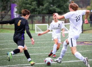 Tigard-based Westside Christian boys soccer journey to playoffs In his first time on the field, freshman Luca Leontescu (2) passes to Peter Veeman (20).