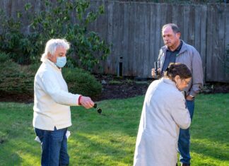 City officials consider regulating backyard chickens and livestock in Tigard Roger Potthoff (left) and his wife consult with local Tigard pest control company owner Randy Witten about the rat problem in his backyard.