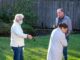 City officials consider regulating backyard chickens and livestock in Tigard Roger Potthoff (left) and his wife consult with local Tigard pest control company owner Randy Witten about the rat problem in his backyard.