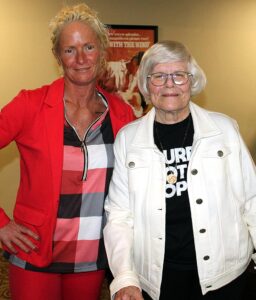 Summerfield Estates Community Development Director Angela Lile (left) stands with Mary Haise after Mary’s presentation about the Apollo 13 mission.