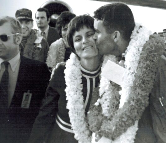 Apollo 13 lunar module pilot Fred W. Haise Jr. greets his wife Mary with a kiss shortly after the Apollo 13 crew and their wives were reunited at Hickam Air Force Base, Hawaii.