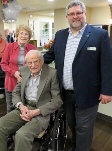 Lionel Domreis celebrated his 100th birthday in 2019 with his companion/caregiver Nannette Williams and Tigard Mayor Jason Snider.