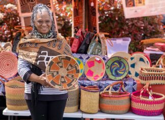 Happenings at the Farmers Market Haoua Cheick displaying a few of the woven basket designs available for purchase at the Bull Mountain Farmers Market each weekend.