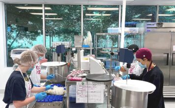 Tigard Milk Bank nourishes infants across the Northwest Members of the milk bank’s processing team dispense donor milk into bottles as part of the pasteurization process.