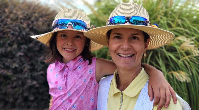Tiny Tigard golf phenom is acing competitions around the U.S. Athena Dehen and her mom Claudia Ciobanu pose for a photo at the Drive Chip Putt skills challenge at the Home Course in Washington.