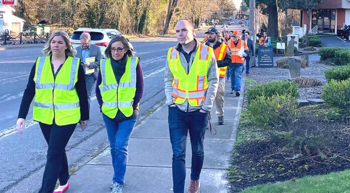 Officials walk Hall Boulevard to keep a Spotlight on its Dangers Mayor Heidi Lueb, U.S. Rep. Andrea Salinas, and State Rep. Ben Bowman (L-R) walking along Hall Boulevard to observe conditions and talk next steps