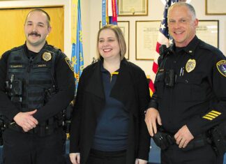 Tigard American Legion Resumes Honoring First-responders and Students Tigard American Legion Post 158 Firefighter of the Year Tyler Sanford (left) stands with Post Commander Allyson Kropf and Tigard Police Commander Jamey McDonald.