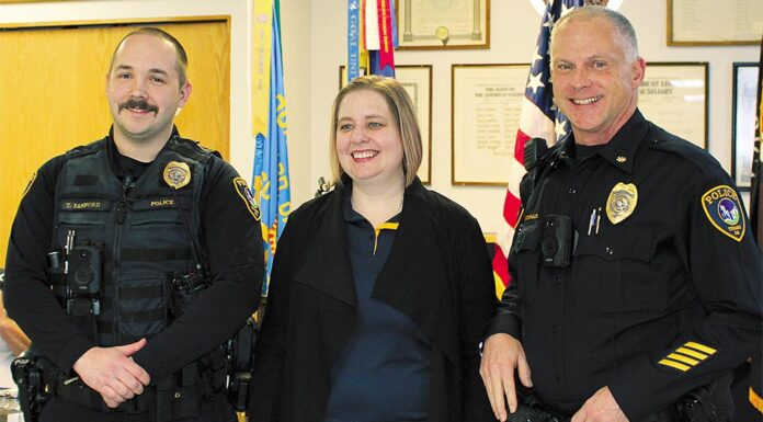 Tigard American Legion Resumes Honoring First-responders and Students Tigard American Legion Post 158 Firefighter of the Year Tyler Sanford (left) stands with Post Commander Allyson Kropf and Tigard Police Commander Jamey McDonald.