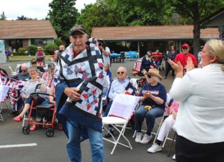 Twenty-three Senior Village veterans get Quilts of Valor on Flag Day