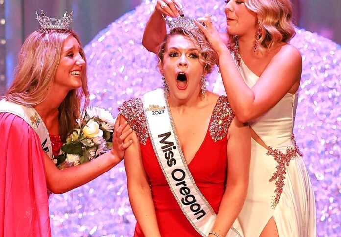 Allison Burke, center, is crowned during the 2023 Miss Oregon competion held in Seaside, Oregon.