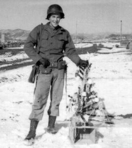 Bob Lorenz was stationed in ‘No Man’s Land’ in Korea but managed to find this scraggly “Charlie Brown” Christmas tree for the holiday season.