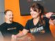 Fat Loss Secrets for Women Over 40 – Part 1 Jordon Hice (left) assists Michelle on a multi-hip machine.