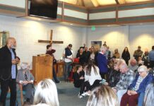 Crowd delivers strong message against homeless staying in cars at church overnight