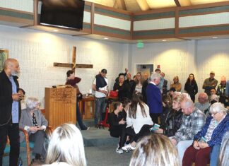 Crowd delivers strong message against homeless staying in cars at church overnight