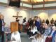 Crowd delivers strong message against homeless staying in cars at church overnight