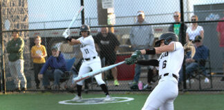 Tigard softball opens league play with road win