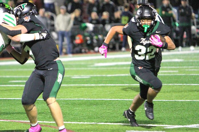 While-just-a-sophomore-Taison-Cepeda-has-been-a-bright-spot-for-Tigard-this-year,-running-for-multiple-scores-out-of-the-backfield.