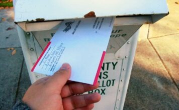 Supreme Court skeptical of allowing states to count mail ballots that arrive after Election Day An Oregonian slides their completed ballot into a secure return box, a fixture of the state's all-mail voting system for over 25 years.
