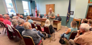 Journalists, Oregon publishers call on governor to veto bill changing public meetings law Roger Averbeck addresses his neighbors at a meeting of the Wallowa County Commission on Aug. 23, 2023. A new law meant to clarify what Oregon's public officials can discuss in serial communications to one another, such as calls and texts, is concerning to journalists and ethics watchdogs who say it erodes public meetings laws and allows important decisions to be made in private. (Photo by Matt Vasilogambros/Stateline)