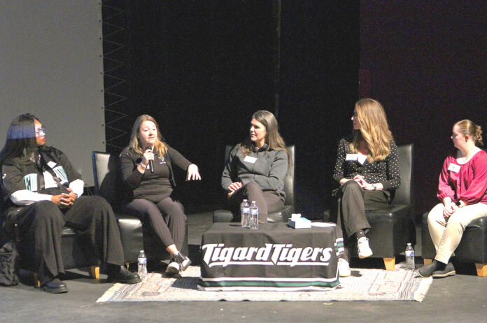 The-panelists-at-Tigard-High-School's-third-Women-in-Sports-Symposium,-from-left,-Libra-Forde,Laurie-(Milligan)-Vizzini,-Shannon-(Sorg)-Strode,-Victoria-Gailey,-and-Abigail-McNatt.