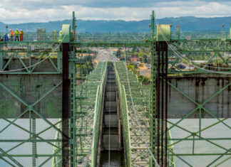 WA and Oregon scale back I-5 bridge ambitions as cost balloons to $14.4B Crews work on the Interstate 5 bridge over the Columbia River in 2019. (Oregon Department of Transportation)