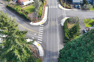A photo shows the intersection of Southwest McDonald Street and Southwest Omara Street-Southwest 98th Avenue.