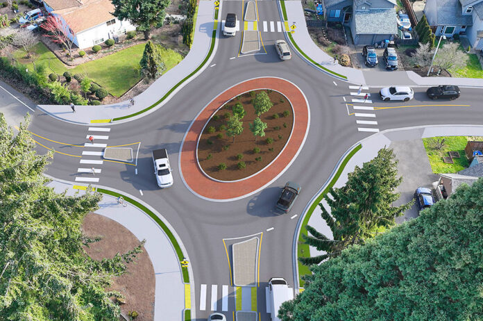 A rendering showa the intersection of Southwest McDonald Street and Southwest Omara Street-Southwest 98th Avenue after the construction of a planned roundabout. Plans call for four new roundabouts on McDonald Street.