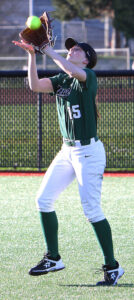 Sophomore Avery Feist hauls in a fly ball in a preseason game.