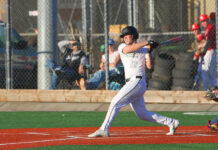 Tigard baseball ready for season despite team turnover Tigard junior Alixander Perez connects with a pitch in a preseason game.