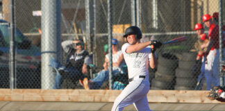 Tigard baseball ready for season despite team turnover Tigard junior Alixander Perez connects with a pitch in a preseason game.