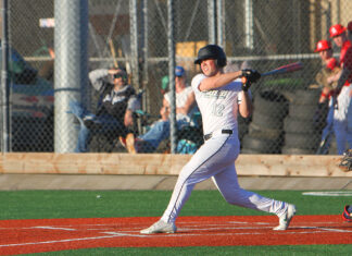 Tigard baseball ready for season despite team turnover Tigard junior Alixander Perez connects with a pitch in a preseason game.