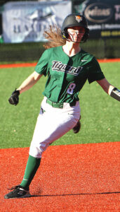 Tigard's Claire Ahlbrecht rounds second base during a preseason
game.