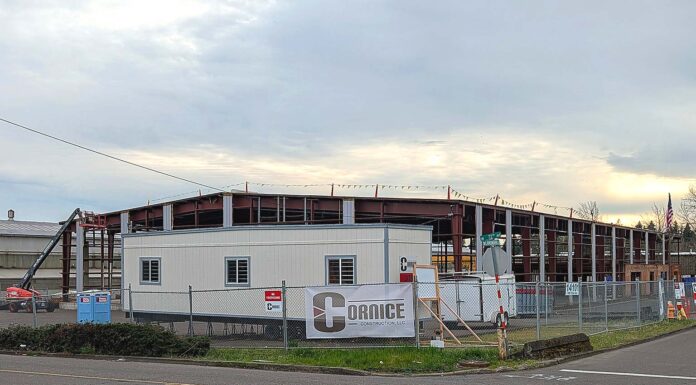 Contract Furnishings Mart jumps 72nd Avenue Construction progresses on Contract Furnishings Mart's new Tigard showroom and headquarters in April 2026. The new site is located next to the Fough and Co. facility.