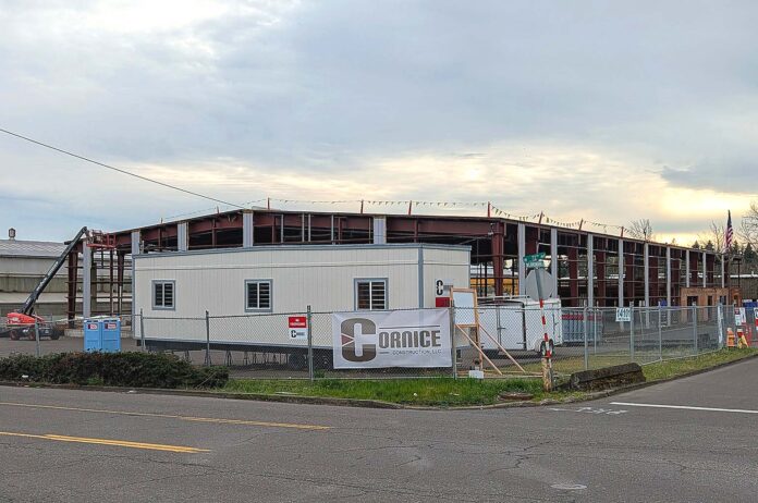 Construction progresses on Contract Furnishings Mart's new Tigard showroom and headquarters in April 2026. The new site is located next to the Fough and Co. facility.
