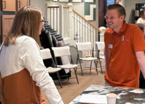 Mountainwood Homes employee talking to a customer