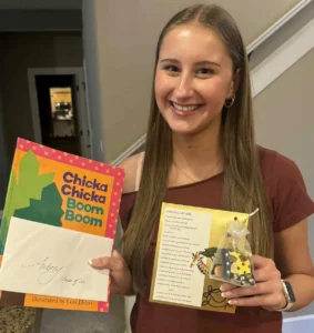 Aubrey Bailey shows the "heart-warming" gifts she received from her former kindergarten teacher, Diane Bonica, as Bailey prepares to attend her Tigard High School graduation commencement on June 5.