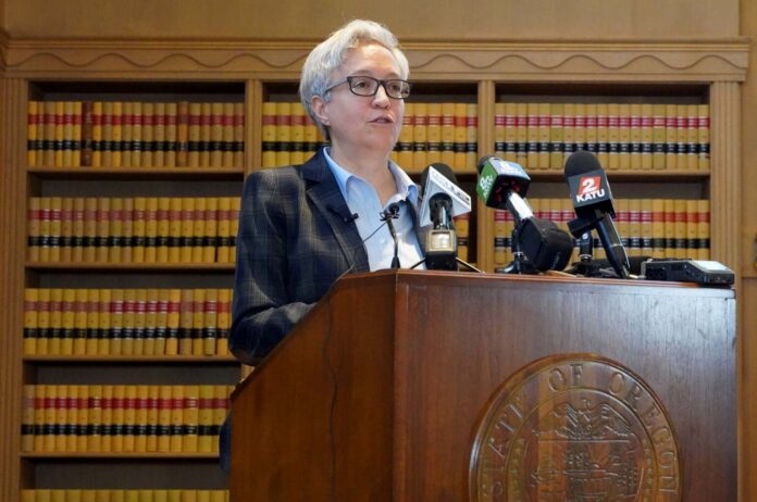 Gov. Tina Kotek talks to reporters on Wednesday, Jan. 31, 2024, at an event to preview the legislative session. The governor and lawmakers plan to prioritize the state’s homelessness and drug addiction crises during the 2024 session.
